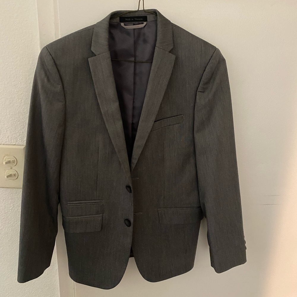 Gorgeous grey blazer. This was worn twice, dry cleaned, and never worn again.